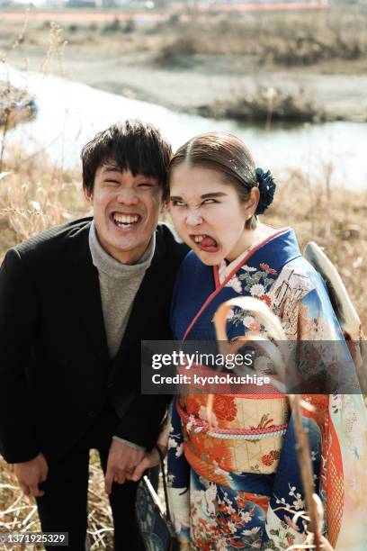 young japanese couple enjoying their youth - seijin no hi stock pictures, royalty-free photos & images