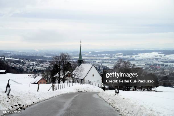 winter road at grenchen, switzerland - solothurn stockfoto's en -beelden