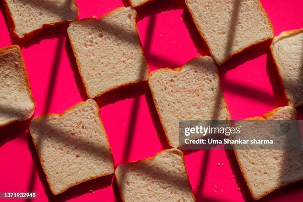 freshly baked white bread. - white bread stock pictures, royalty-free photos & images