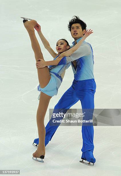 Xiaoyu Yu and Yang Jin of China compete during the Pairs Figure Skating event at the Olympic Ice Stadium on January 16, 2012 in Innsbruck, Austria.