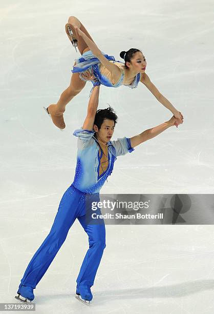 Xiaoyu Yu and Yang Jin of China compete during the Pairs Figure Skating event at the Olympic Ice Stadium on January 16, 2012 in Innsbruck, Austria.