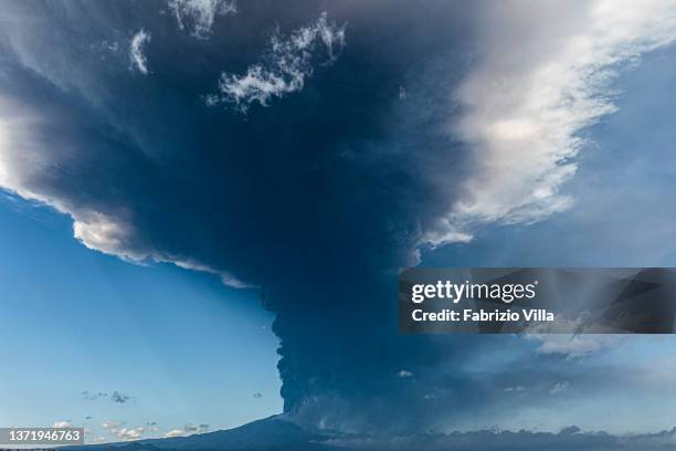 Aerial view of the Etna volcano eruption seen from the city of Catania with a 10 km high ash cloud on February 21, 2022 in Catania, Italy. A new...