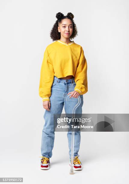 portrait of young person with walking stick - fotostock stock-fotos und bilder