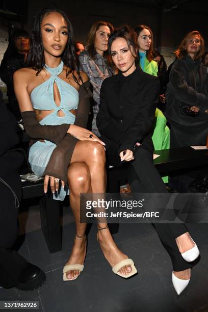 Jourdan Dunn and Victoria Beckham attend the Supriya Lele show during London Fashion Week February 2022 at the BFC NEWGEN Show Space on February 21,...