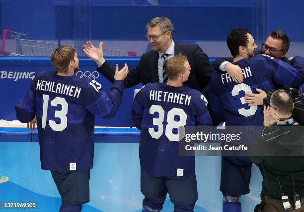 Coach of Finland Jukka Jalonen congratulates Valtteri Kemilainen of Finland after winning the Gold Medal game between Team Finland and Team ROC on...