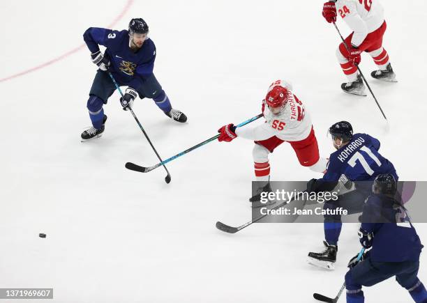 Vladimir Tkachyov of Russia, Niklas Friman of Finland during the Gold Medal game between Team Finland and Team ROC on Day 16 of the Beijing 2022...