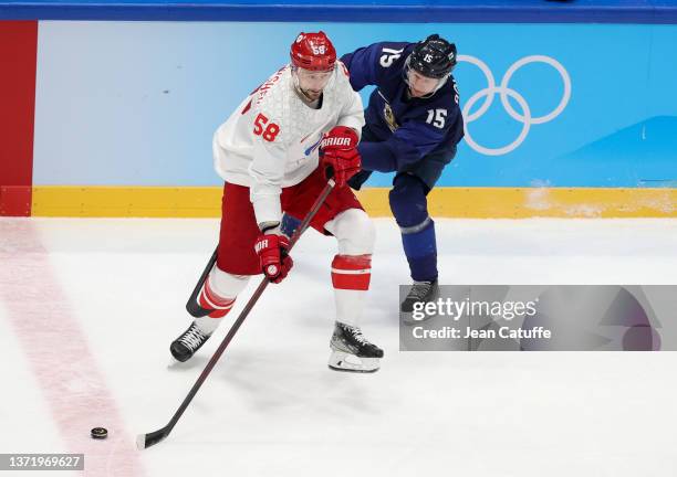 Anton Slepyshev of Russia, Miro Aaltonen of Finland during the Gold Medal game between Team Finland and Team ROC on Day 16 of the Beijing 2022 Winter...