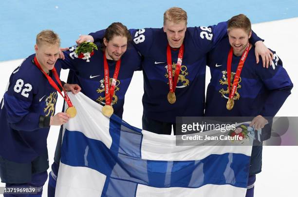 Harri Pesonen, Sami Vatanen, Joonas Nattinen, Valtteri Kemilainen of Finland pose with their medals after the 'Medal Cermony' of the Gold Medal game...