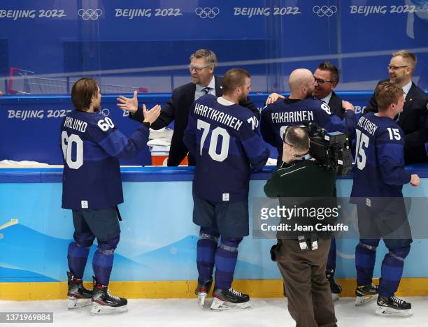 Coach of Finland Jukka Jalonen congratulates Markus Grandlund of Finland after winning the Gold Medal game between Team Finland and Team ROC on Day...