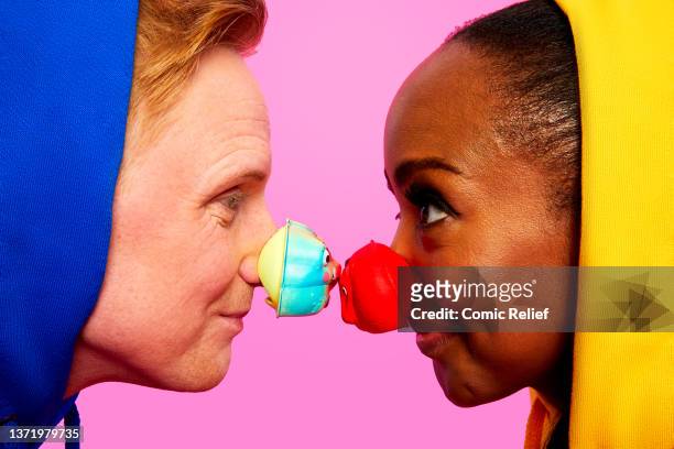 The One Show's Angelica Bell and Owain Wyn Evans pose before going head-to-head as they compete in the Red Nose and Spoon Race for Red Nose Day 2022...