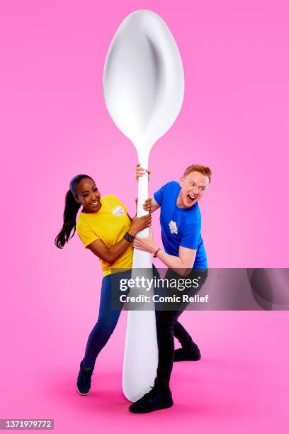 The One Show's Angelica Bell and Owain Wyn Evans pose before going head-to-head as they compete in the Red Nose and Spoon Race for Red Nose Day 2022...