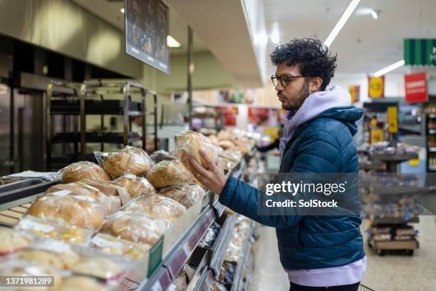 shopping in a store bakery - bread shop stock pictures, royalty-free photos & images