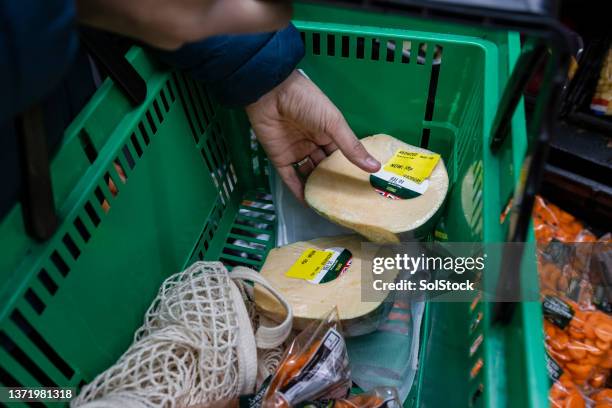 being frugal at the supermarket - expiry date stock pictures, royalty-free photos & images