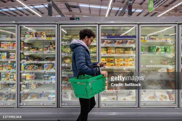 buying convenient food - refrigerator stock pictures, royalty-free photos & images