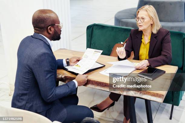 team of lawyers discussing deal in team - court notice stock pictures, royalty-free photos & images