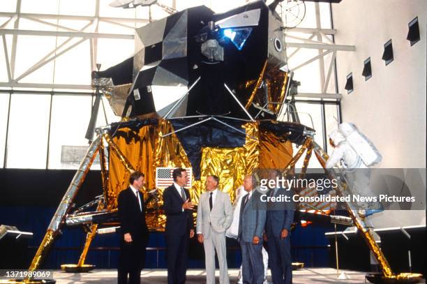 View of, from left, US Vice President Dan Quayle, US President George HW Bush , and astronauts Neil Armstrong , Buzz Aldrin , and Michael Collins as...