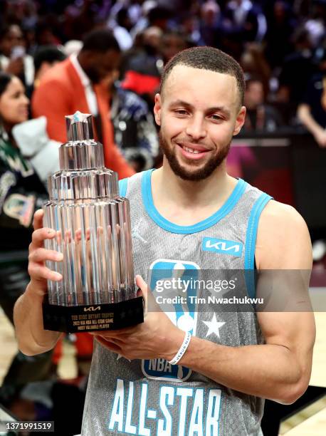 Stephen Curry of Team LeBron holds the Kobe Bryant Trophy after being named MVP during the 2022 NBA All-Star Game at Rocket Mortgage Fieldhouse on...