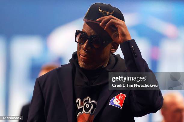 Dennis Rodman reacts after being introduced as part of the NBA 75th Anniversary Team during the 2022 NBA All-Star Game at Rocket Mortgage Fieldhouse...