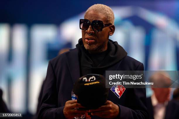 Dennis Rodman reacts after being introduced as part of the NBA 75th Anniversary Team during the 2022 NBA All-Star Game at Rocket Mortgage Fieldhouse...
