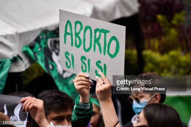 Pro-choice demonstrators protest with banners and signs in support of the decriminalization of abortions as both Pro-Choice and anti-abortion...