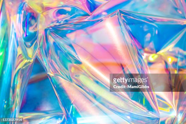 light is reflected on the hologram sheet - hologram sticker stock pictures, royalty-free photos & images
