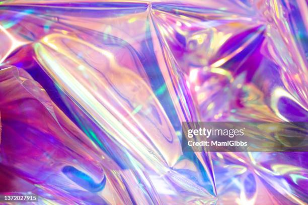 light is reflected on the hologram sheet - hologram stock pictures, royalty-free photos & images