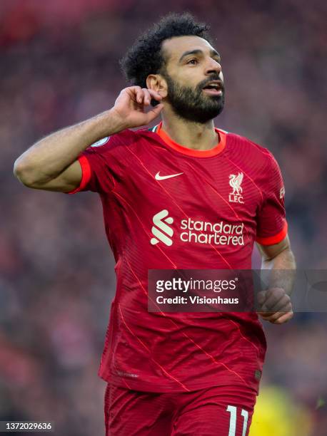 Mohamed Salah of Liverpool celebrates scoring his team's second goal and his one hundred and fiftieth for the club during the Premier League match...