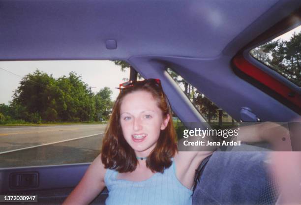 vintage y2k fashion teenager in backseat car passenger 2000s style 1990s - 90s teens stock pictures, royalty-free photos & images