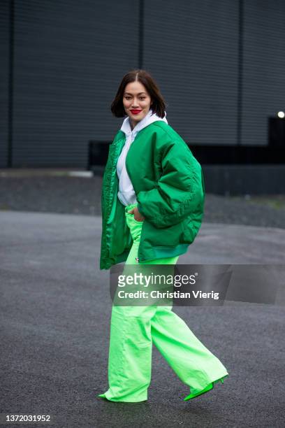 Tiffany Hsu seen wearing green pants, bomber jacket outside David Koma during London Fashion Week February 2022 on February 20, 2022 in London,...