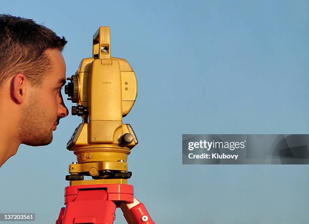 surveyor close-up - theodolite stock pictures, royalty-free photos & images