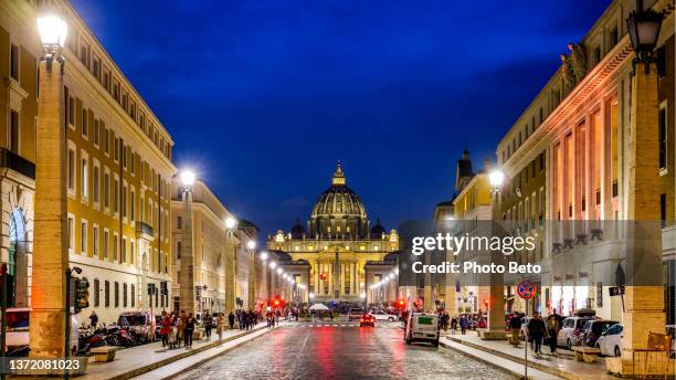 a beautiful twilight scene along via della conciliazione in rome with st. peter's basilica in the background - st peter's square stock pictures, royalty-free photos & images