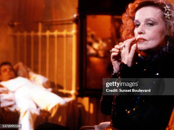 French actress Jeanne Moreau on the set of the film “Querelle” directed by Rainer Werner Fassbinder.