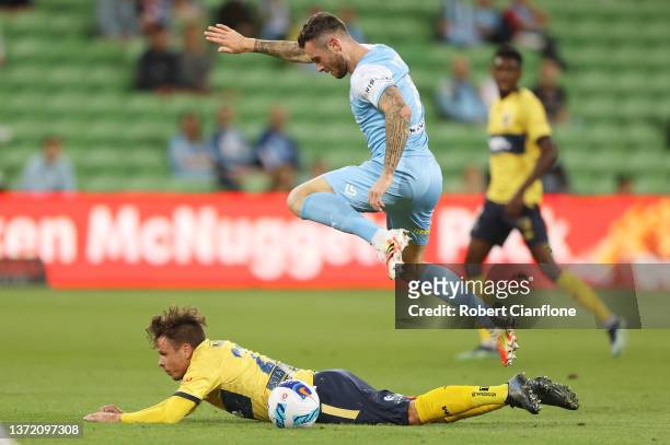 Aiden O'Neill of Melbourne City fouls Nicolai Muller of the Mariners during the A-League Men's match between Melbourne City and Central Coast...