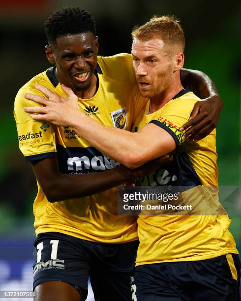 Oliver Bozanic of the Mariners celebrates a goal with Beni Nkololo of the Mariners during the A-League Men's match between Melbourne City and Central...