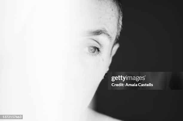 half face of woman with shaved head - eye cross section stock pictures, royalty-free photos & images