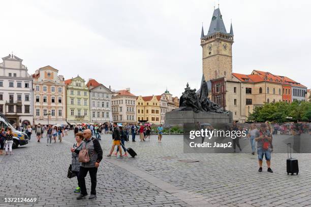 people on the old townsquare in prague - prague cafe stock pictures, royalty-free photos & images