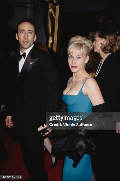 Actors Nicolas Cage and Patricia Arquette during the 68th Annual Academy Awards at Dorothy Chandler Pavilion in Los Angeles, California, United...