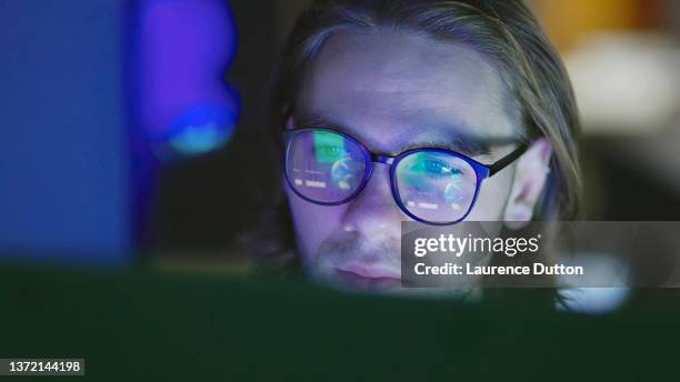 close up night office worker - close up face computer stock pictures, royalty-free photos & images