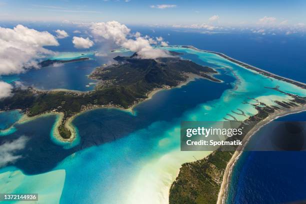 aerial bora bora mt otemanu south pacific ocean - coral sea stock-fotos und bilder