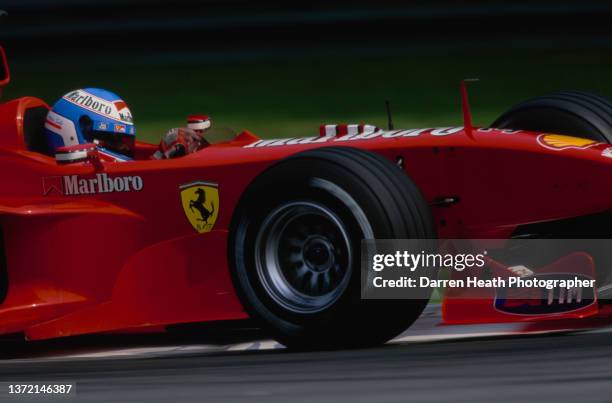 Mika Salo of Finland drives the Scuderia Ferrari Marlboro Ferrari F399 Ferrari V10 during the Formula One Italian Grand Prix on 12th September 1999...