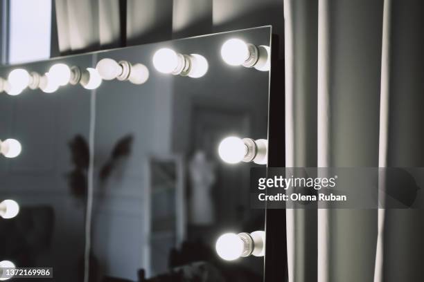 mirror reflecting big room. - vestuario entre bastidores fotografías e imágenes de stock