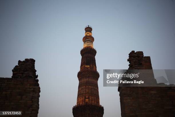 Views of the Qutab Minar the massive Victory Tower, the one thousand year old minaret, a public monument in the heart of New Delhi. Seen on February...