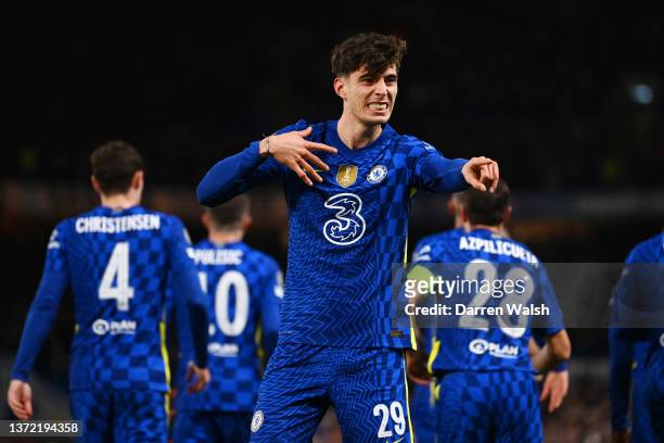 Kai Havertz of Chelsea celebrates after scoring their team's first goal during the UEFA Champions League Round Of Sixteen Leg One match between...