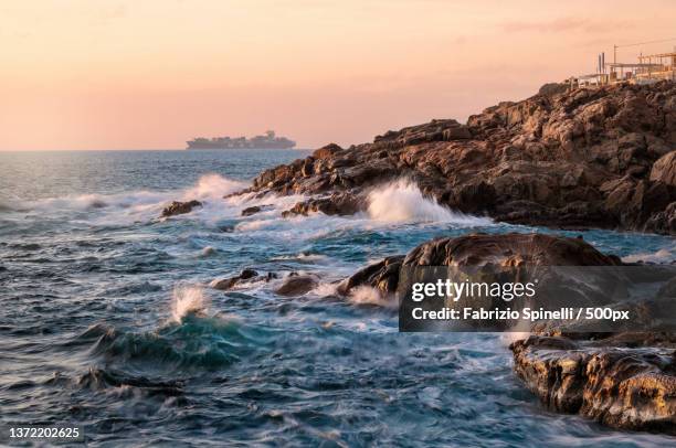 scenic view of sea against sky during sunset,calafuria,livorno,italy - toscana livorno stock pictures, royalty-free photos & images