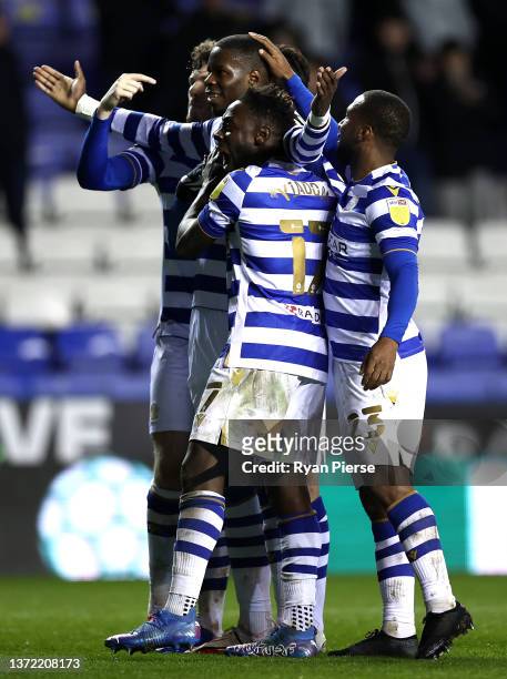 Lucas Joao of Reading celebrates with teammates after scoring their team's first goal during the Sky Bet Championship match between Reading and...
