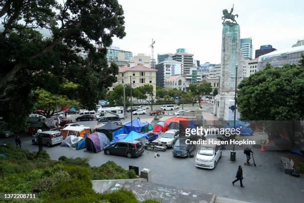 Vehicles and tents surround the Wellington Cenotaph during a protest at Parliament on February 23, 2022 in Wellington, New Zealand. The perimeter of...
