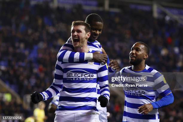 John Swift of Reading celebrates with teammates after scoring their team's second goal during the Sky Bet Championship match between Reading and...
