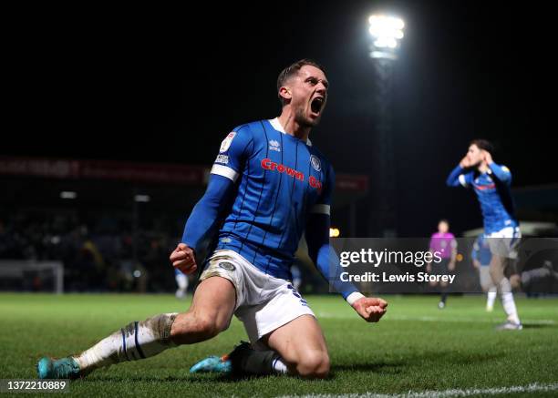 James Ball of Rochdale celebrates after scoring their side's first goal during the Sky Bet League Two match between Rochdale and Port Vale at Crown...