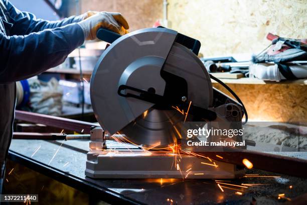 cutting metal - sawing stock pictures, royalty-free photos & images