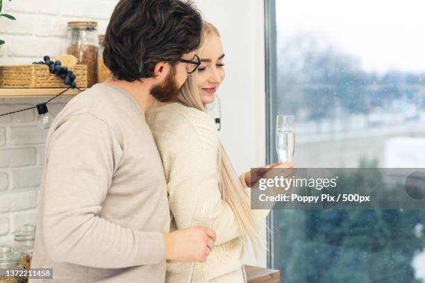 european middle-aged man and his beautiful wife celebrating,getting - drunk wife at party - fotografias e filmes do acervo